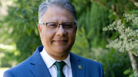 A portrait of Anshuman Razdan wearing a suit and tie.