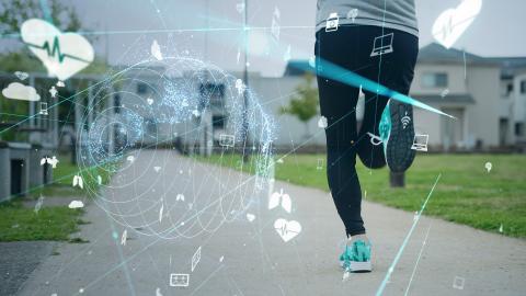 A person jogging on a pathway with digital graphics overlaying the image.