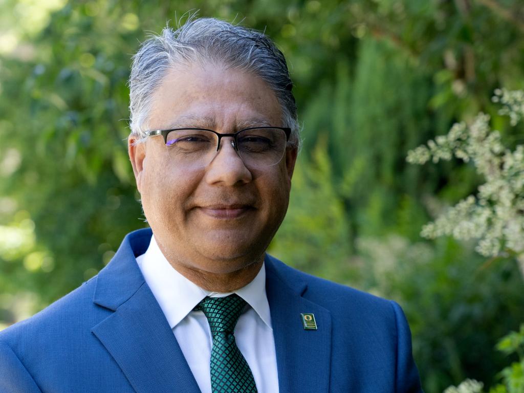 A portrait of Anshuman Razdan wearing a suit and tie.