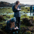 Maddy Rusk and Katie Richardson, both seniors in the marine biology program, take notes to catalogue their finds during tidepooling.