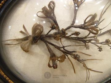 A small bouquet made of human hair.