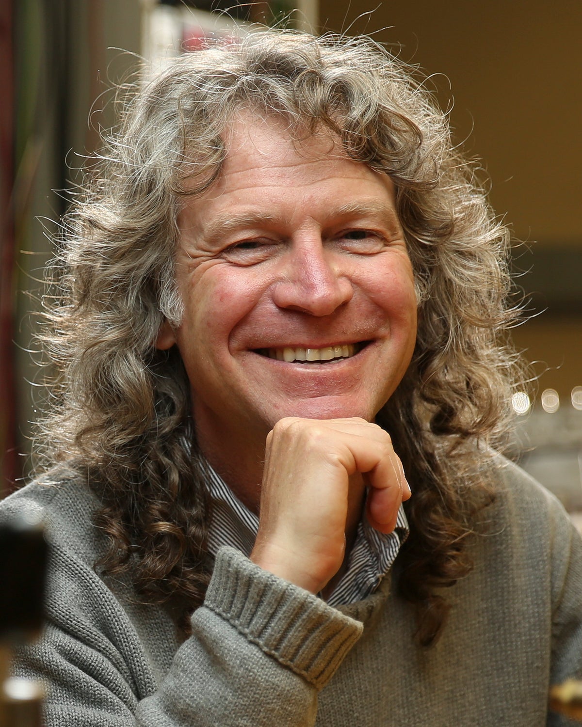 Physicist Richard Taylor with chin on thumb and smile